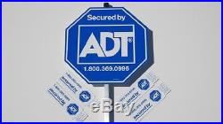 Two (2) adt security sign. Eight (8) stickers / decals